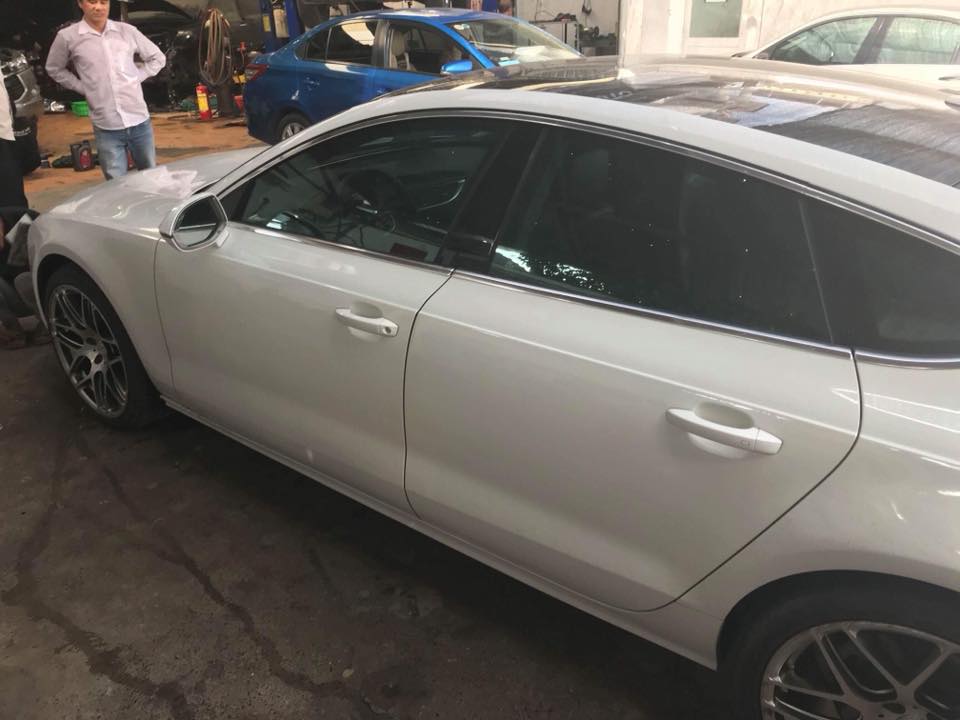 Audi A7 3.0AT 2011 - Cần bán xe Audi A7 2011 màu trắng nhập Đức