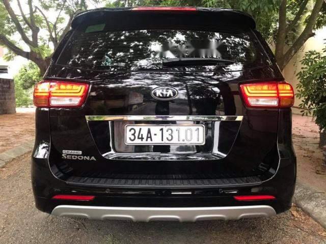 Kia Sedona GATH 3.3AT 2015 - Cần bán lại xe Kia Sedona GATH 3.3AT năm 2015, màu đen như mới