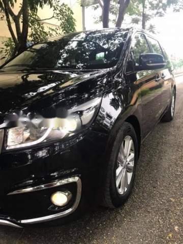 Kia Sedona GATH 3.3AT 2015 - Cần bán lại xe Kia Sedona GATH 3.3AT năm 2015, màu đen như mới