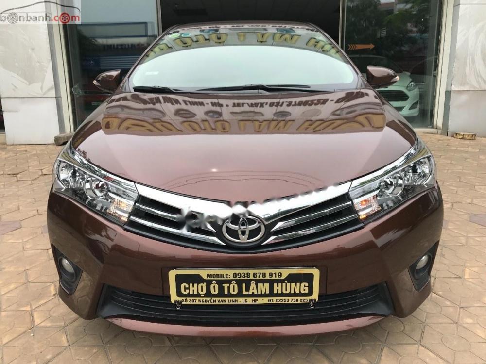 Toyota Corolla altis 1.8G   2015 - Cần bán xe Toyota Corolla altis 1.8G sản xuất năm 2015, màu nâu còn mới giá cạnh tranh