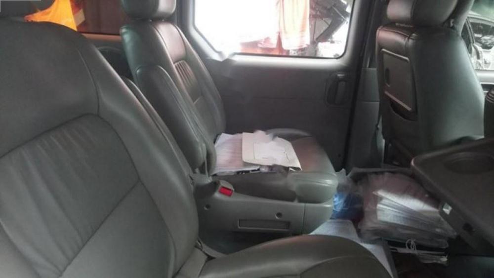 Kia Carnival GS 2.5 MT 2007 - Chính chủ bán xe Kia Carnival GS 2.5 MT 2007, màu xanh đen