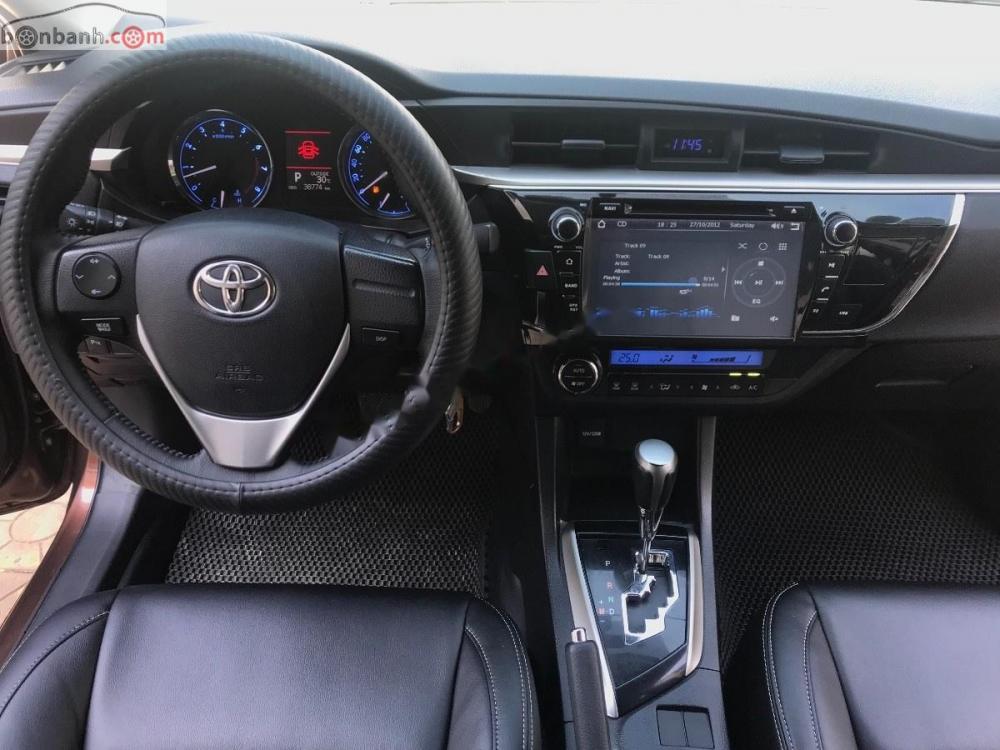 Toyota Corolla altis 1.8G   2015 - Cần bán xe Toyota Corolla altis 1.8G sản xuất năm 2015, màu nâu còn mới giá cạnh tranh