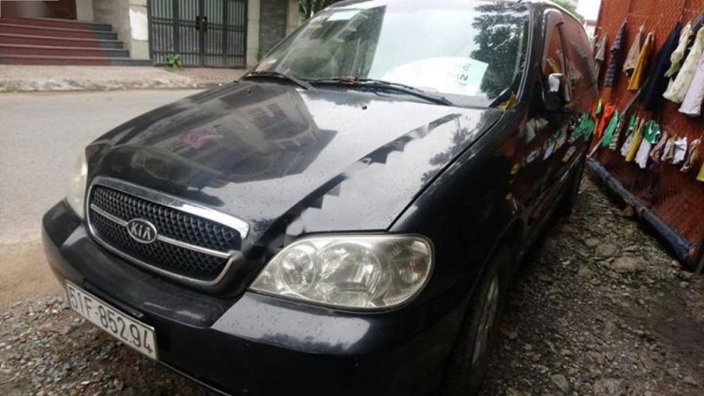 Kia Carnival GS 2.5 MT 2007 - Chính chủ bán xe Kia Carnival GS 2.5 MT 2007, màu xanh đen