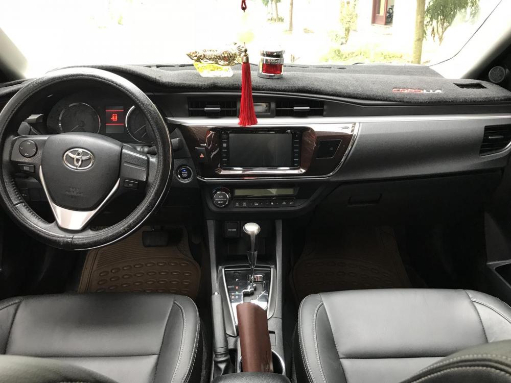 Toyota Corolla altis 2.0V 2015 - Cần bán xe Toyota Corolla Altis đời 2015 màu cà phê sữa, giá chỉ 665 triệu, xe cực đẹp, cực chất