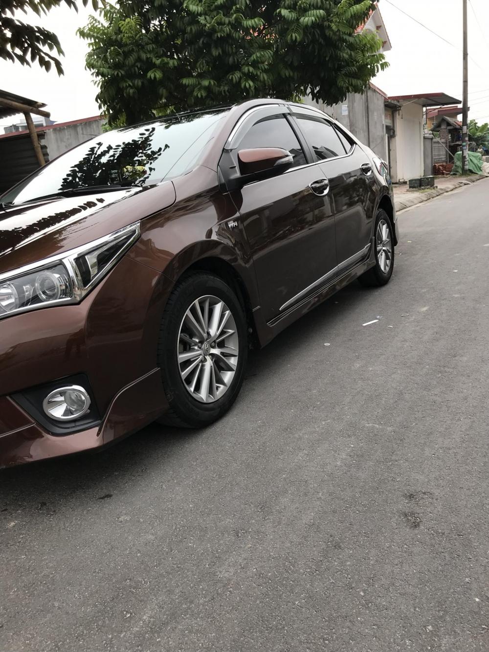 Toyota Corolla altis 2.0V 2015 - Cần bán xe Toyota Corolla Altis đời 2015 màu cà phê sữa, giá chỉ 665 triệu, xe cực đẹp, cực chất