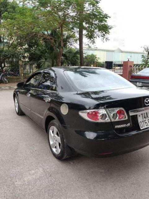 Mazda 6 2003 - Cần bán lại xe Mazda 6 đời 2003, màu đen số sàn