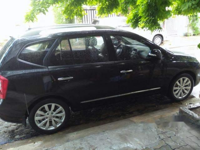 Kia Carens 2011 - Cần bán lại xe Kia Carens sản xuất 2011, màu đen số tự động