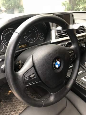 BMW 3 Series  320i  2013 - Bán BMW 3 Series 320i năm sản xuất 2013, màu trắng