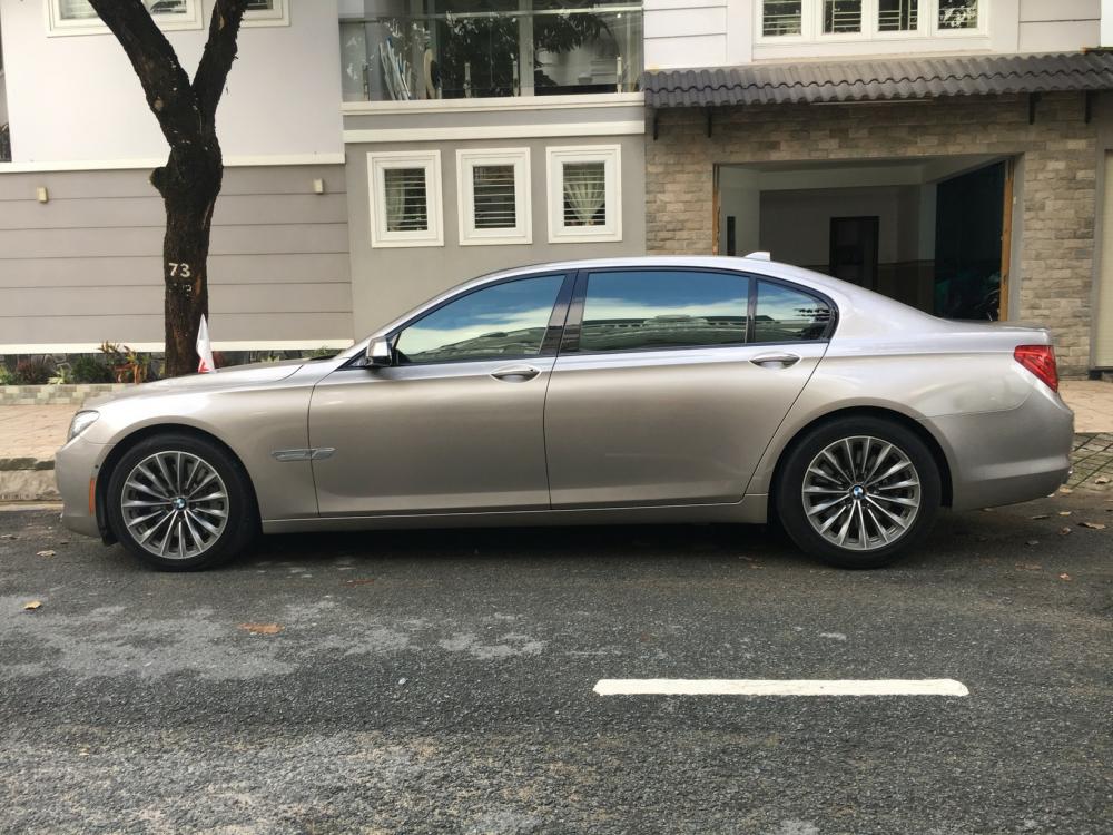 BMW 7 Series 750Li 2011 - Gia đình cần bán BMW 750 Li nhập Mỹ, SX 2011, màu vàng cát