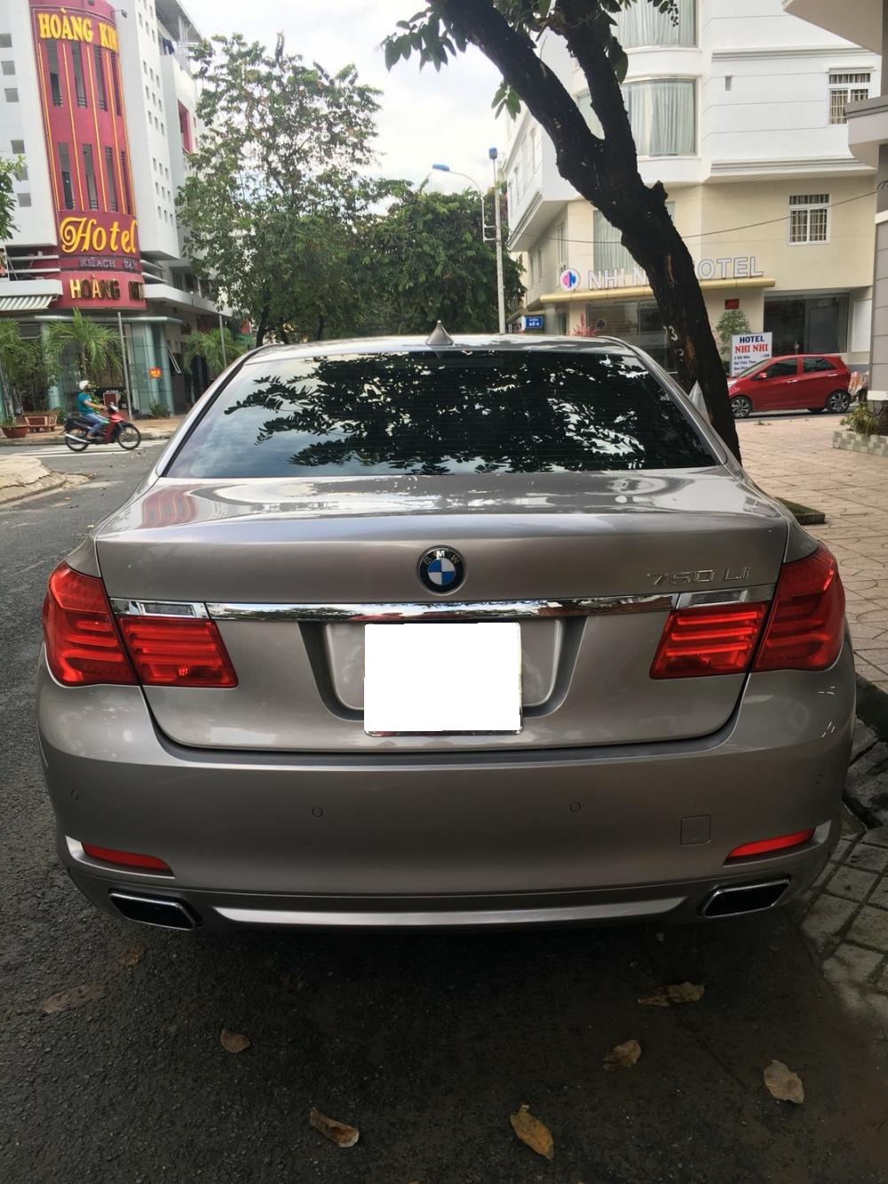 BMW 7 Series 750Li 2011 - Gia đình cần bán BMW 750 Li nhập Mỹ, SX 2011, màu vàng cát