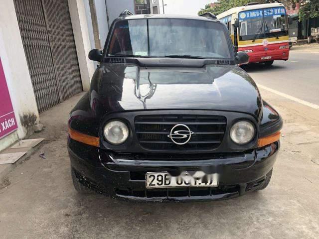 Ssangyong Korando  MT 2003 - Bán xe Ssangyong Korando MT đời 2003, màu đen, máy gầm ngon