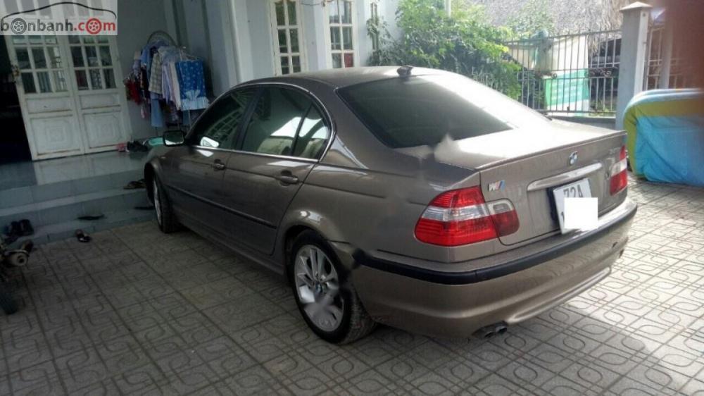 BMW 3 Series 325i 2003 - Cần bán gấp BMW 3 Series 325i đời 2003, màu vàng