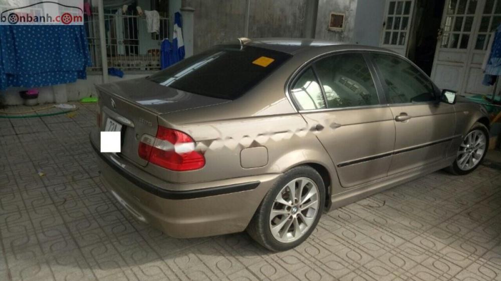 BMW 3 Series 325i 2003 - Cần bán gấp BMW 3 Series 325i đời 2003, màu vàng