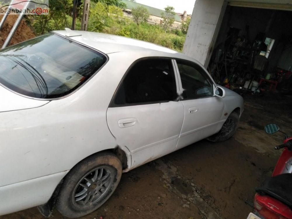 Mazda 626 1996 - Bán xe Mazda 626 sản xuất năm 1996, màu trắng, giá tốt