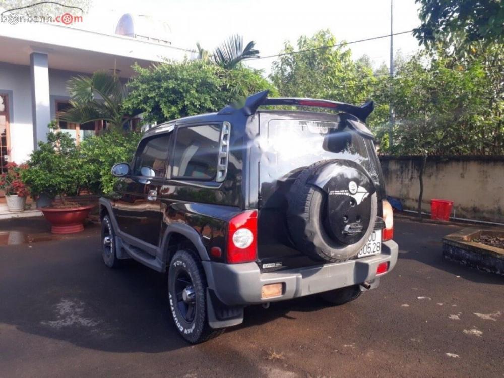 Ssangyong Korando AT 2003 - Cần bán Ssangyong Korando at đời 2003, màu đen, xe nhập xe gia đình, giá chỉ 178 triệu