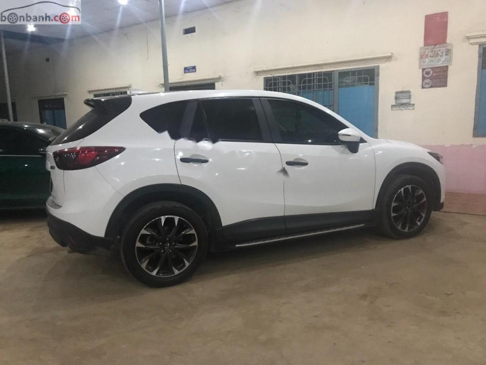 Mazda CX 5 2.0 2016 - Bán Mazda CX 5 2.0 đời 2016, màu trắng, biển số víp Sài Gòn