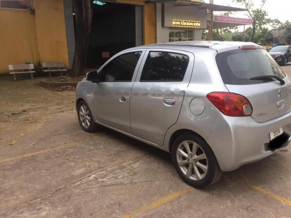 Mitsubishi Mirage 1.2 MT 2015 - Bán Mitsubishi Mirage 1.2 MT đời 2015, màu bạc, xe nhập 