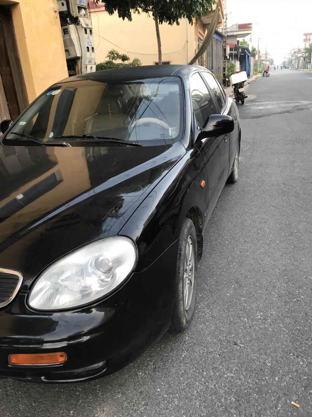 Daewoo Leganza CDX 1998 - Bán Daewoo Leganza sản xuất 1998 màu đen, giá 75 triệu