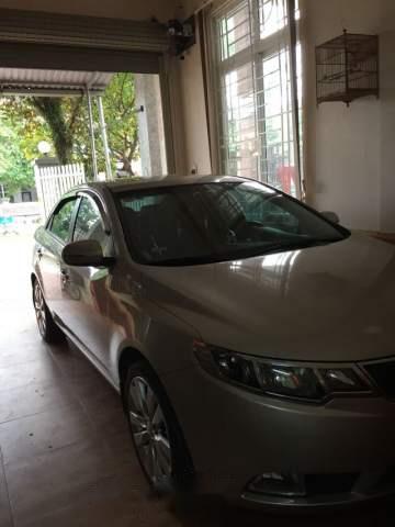 Kia Forte SX MT 2012 - Bán xe Kia Forte SX MT sản xuất năm 2012, màu vàng cát