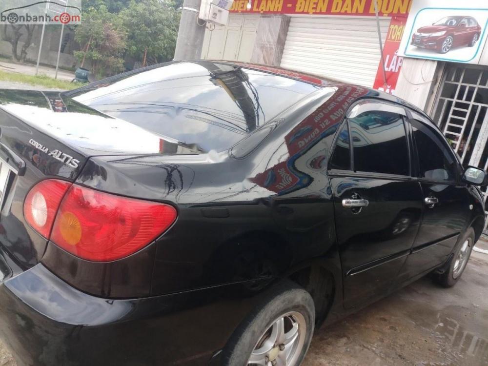 Toyota Corolla altis 2003 - Bán ô tô Toyota Corolla altis năm 2003, màu đen, nhập khẩu như mới 