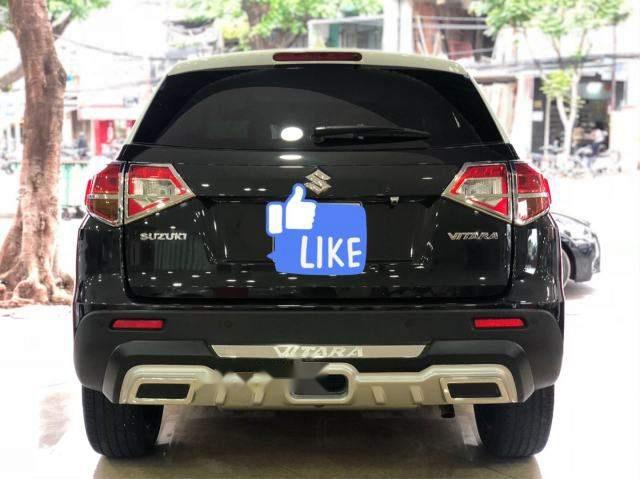 Suzuki Vitara 1.6AT 2015 - Cần bán Suzuki Vitara 1.6AT sản xuất 2015, màu đen, nhập khẩu xe gia đình