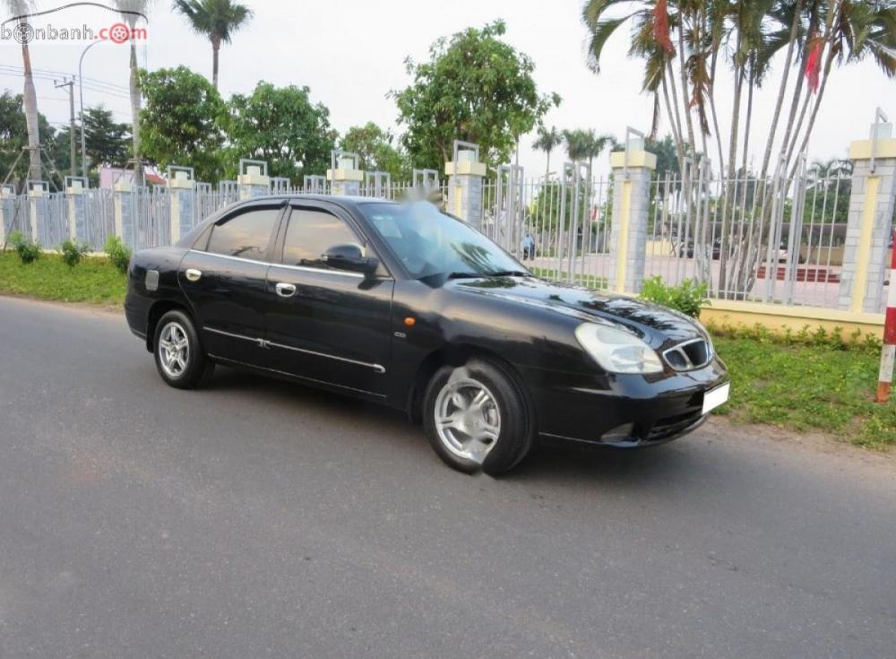 Daewoo Nubira II 2.0 1998 - Cần bán gấp Daewoo Nubira II 2.0 1998, màu đen còn mới giá cạnh tranh