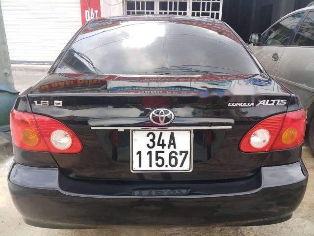 Toyota Corolla altis   2003 - Cần bán Toyota Corolla altis sản xuất năm 2003, màu đen, nhập khẩu