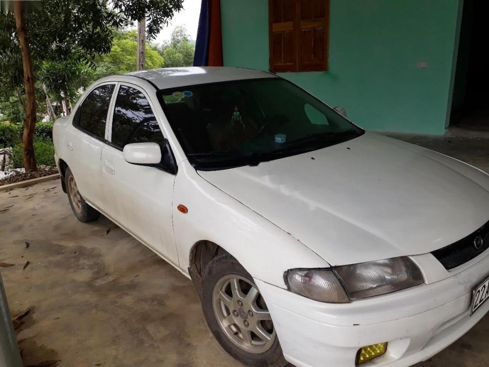 Mazda 323 GLXi 1.6 MT 2000 - Cần bán Mazda 323 GLXi 1.6 MT năm 2000, màu trắng, nhập khẩu chính chủ 