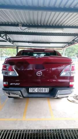 Mazda BT 50 2014 - Cần bán lại xe Mazda BT 50 2014, màu đỏ, xe nhập số sàn, giá 450tr