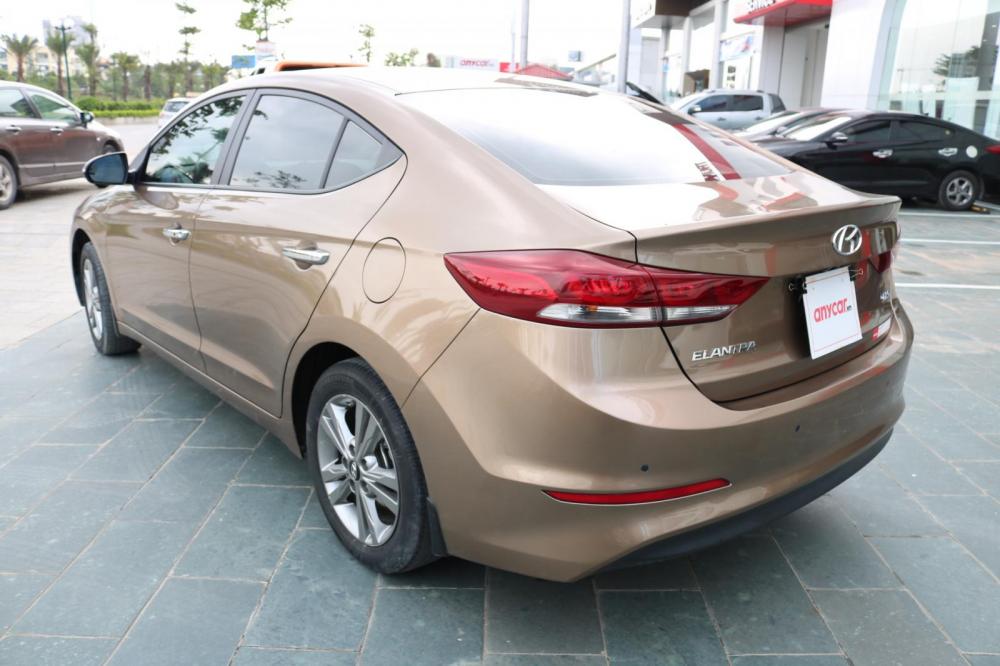 Hyundai Elantra 1.6AT 2016 - Bán ô tô Hyundai Elantra 1.6AT sản xuất năm 2016, màu nâu