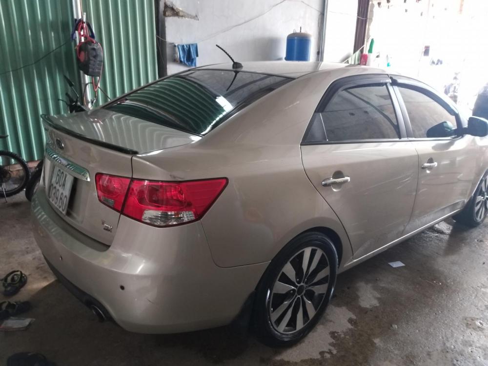 Kia Forte SX  2012 - Bán xe Kia Forte sx năm 2012, màu kem (be) còn mới, giá chỉ 340 triệu