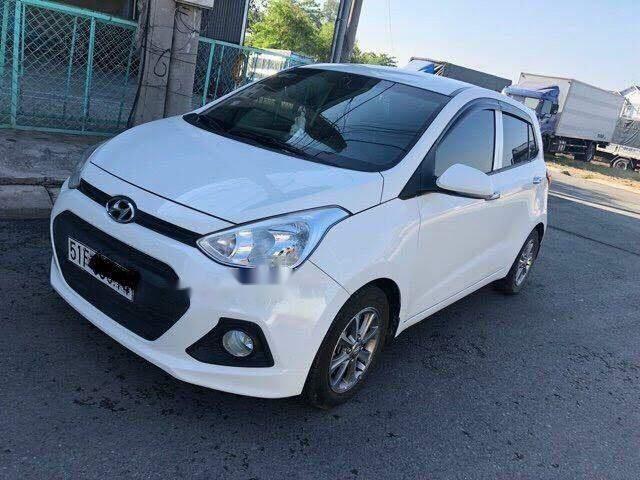 Hyundai Grand i10   2015 - Bán Hyundai Grand i10 năm sản xuất 2015, màu trắng, nhập khẩu