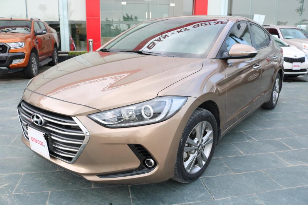 Hyundai Elantra 1.6AT 2016 - Bán ô tô Hyundai Elantra 1.6AT sản xuất năm 2016, màu nâu