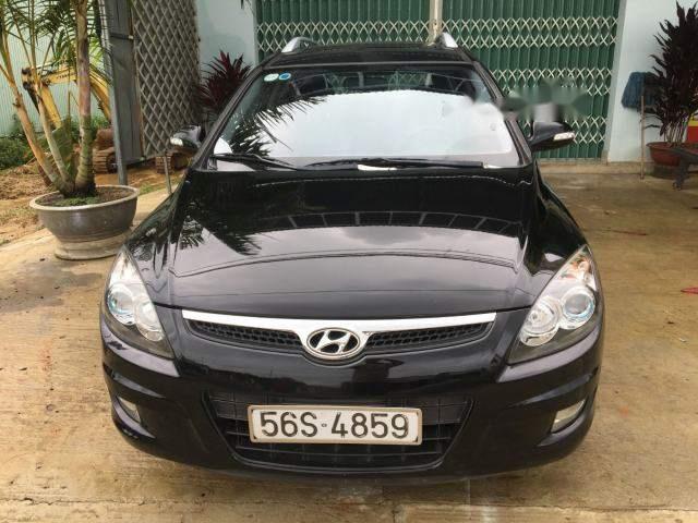 Hyundai i30   2010 - Bán lại xe Hyundai i30 đời 2010, màu đen, nhập khẩu