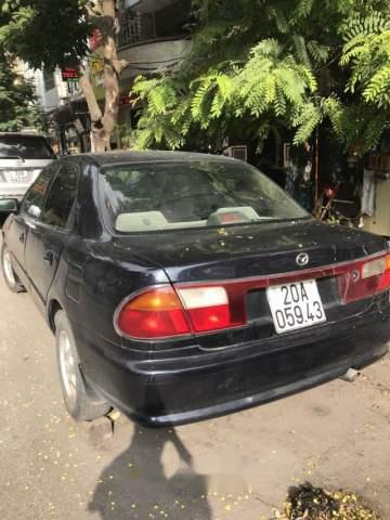 Mazda 323 1999 - Bán Mazda 323 sản xuất 1999, màu đen, nhập khẩu nguyên chiếc, giá chỉ 95 triệu