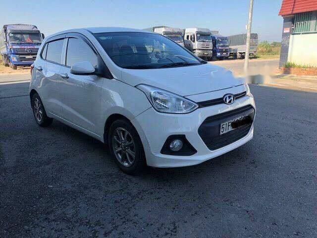 Hyundai Grand i10   2015 - Bán Hyundai Grand i10 năm sản xuất 2015, màu trắng, nhập khẩu