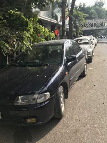 Mazda 323 1999 - Bán Mazda 323 sản xuất 1999, màu đen, nhập khẩu nguyên chiếc, giá chỉ 95 triệu