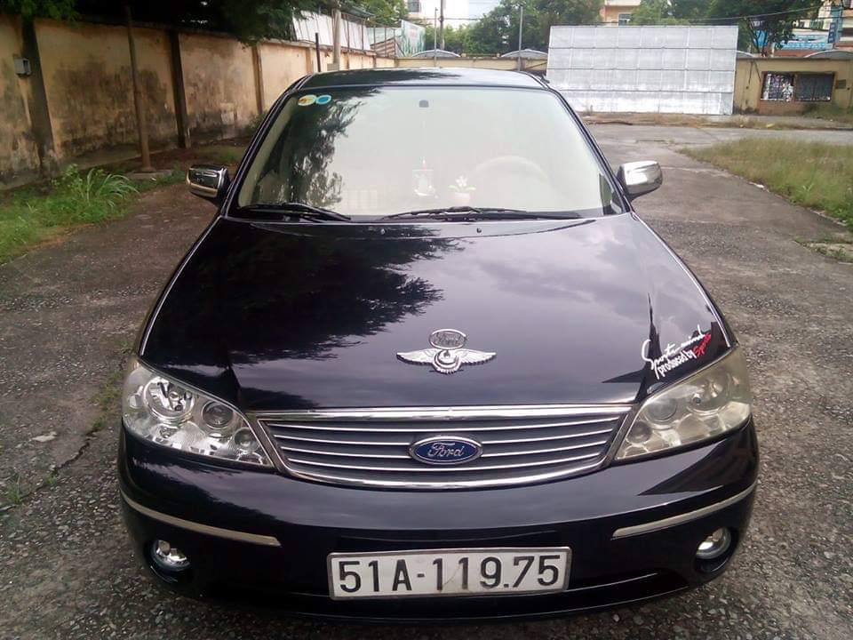 Ford Laser GHIA 2004 - Bán Ford Laser GHIA 2004, màu đen chính chủ, giá 242tr