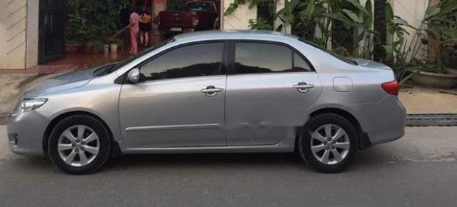 Toyota Corolla altis  1.8AT 2010 - Bán lại xe Toyota Corolla altis 1.8AT 2010, màu bạc, số tự động