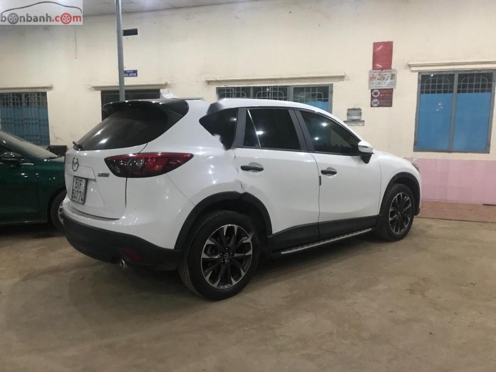 Mazda CX 5 2.0 2016 - Cần bán Mazda CX 5 2.0 sản xuất năm 2016, màu trắng chính chủ, 790 triệu