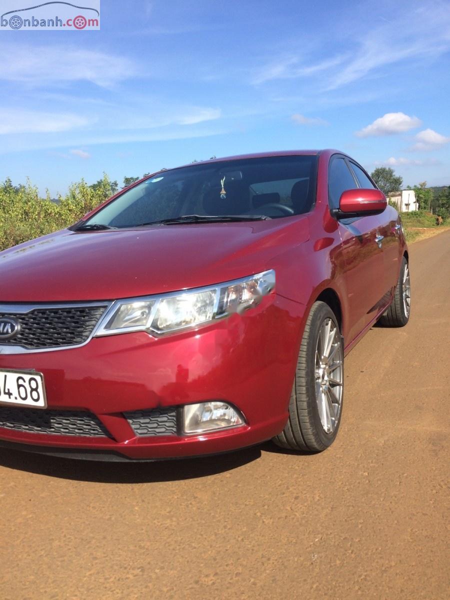 Kia Forte EX 1.6 MT 2011 - Cần bán xe Kia Forte EX 1.6 MT 2011, màu đỏ số sàn, giá chỉ 349 triệu