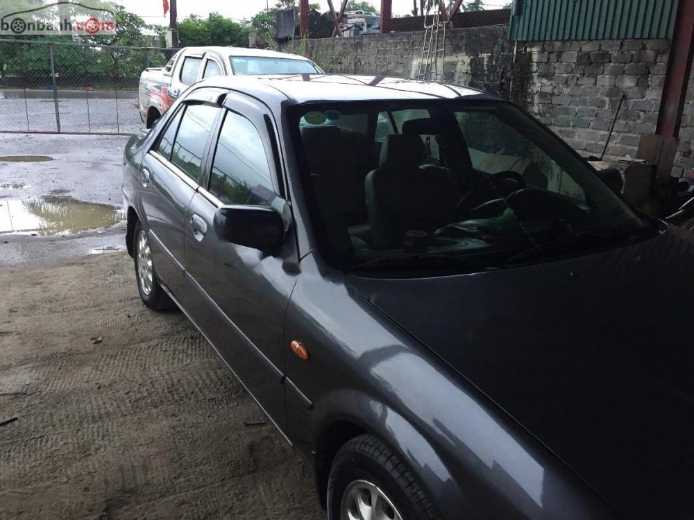 Ford Laser Delu 1.6 MT 2001 - Cần bán gấp Ford Laser Delu 1.6 MT sản xuất 2001, màu đen, giá 150tr