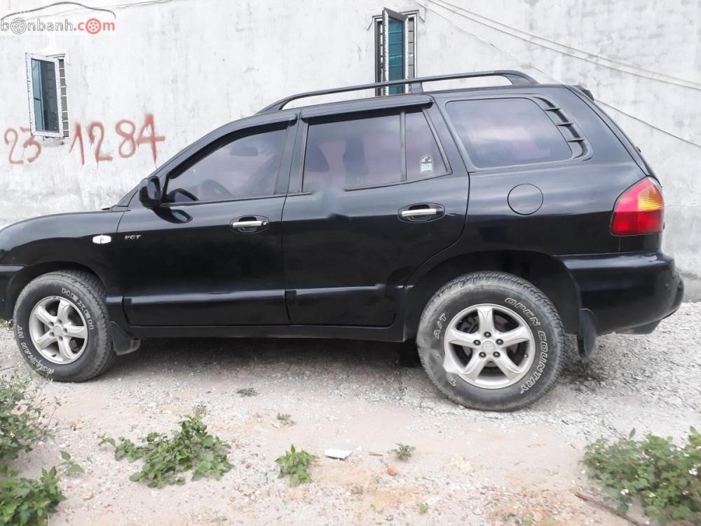 Hyundai Santa Fe Gold 2.0 AT 2005 - Bán Hyundai Santa Fe Gold 2.0 AT sản xuất 2005, màu đen, xe nhập như mới, 285tr