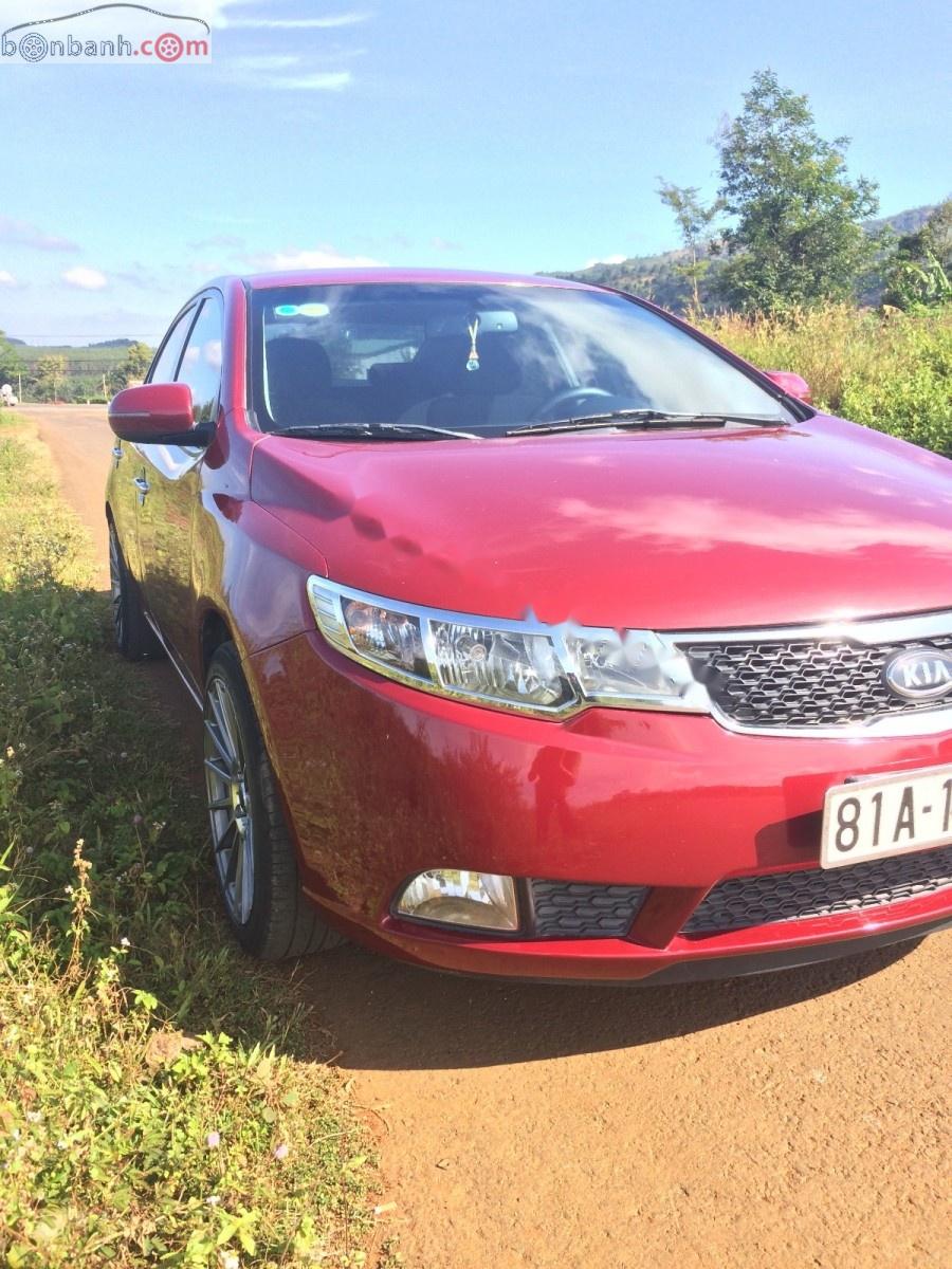 Kia Forte EX 1.6 MT 2011 - Cần bán xe Kia Forte EX 1.6 MT 2011, màu đỏ số sàn, giá chỉ 349 triệu