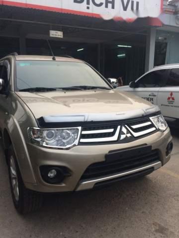 Mitsubishi Pajero Sport 2016 - Cần bán lại xe Mitsubishi Pajero Sport 2016, màu vàng như mới, giá 789tr