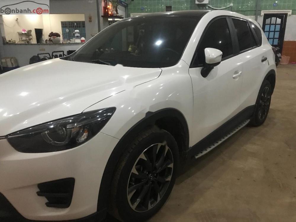 Mazda CX 5 2.0 2016 - Cần bán Mazda CX 5 2.0 sản xuất năm 2016, màu trắng chính chủ, 790 triệu