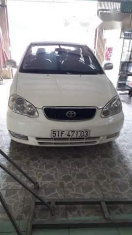 Toyota Corolla altis  1.3MT   2003 - Bán Toyota Corolla altis 1.3MT sản xuất 2003, màu trắng, xe nhập