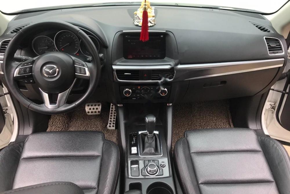 Mazda CX 5 2.0 AT 2016 - Cần bán gấp Mazda CX 5 2.0 AT 2016, màu trắng chính chủ, giá tốt