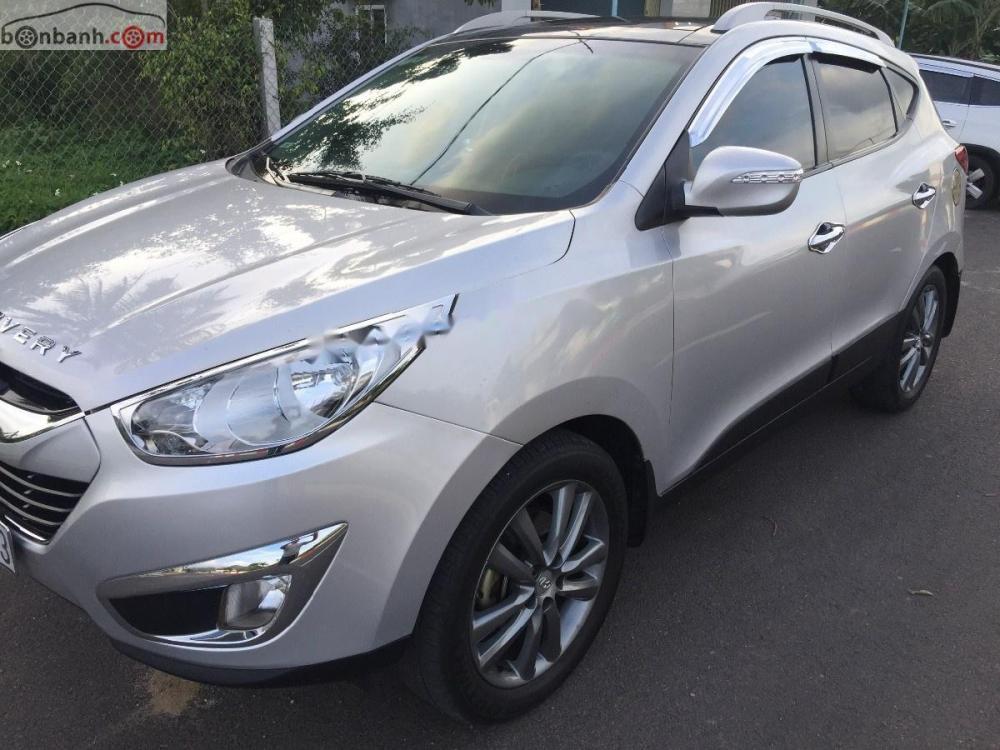 Hyundai Tucson 2.0 AT 4WD 2011 - Bán Hyundai Tucson 2.0 AT 4WD đời 2011, màu bạc, nhập khẩu, số tự động