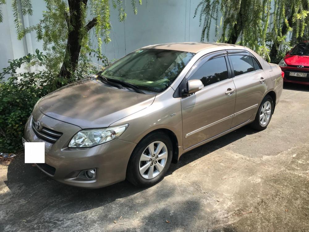 Toyota Corolla altis 2009 - Cần bán xe Toyota Altis năm sản xuất 9/2009, số sàn, màu cà phê sữa, biển số TP